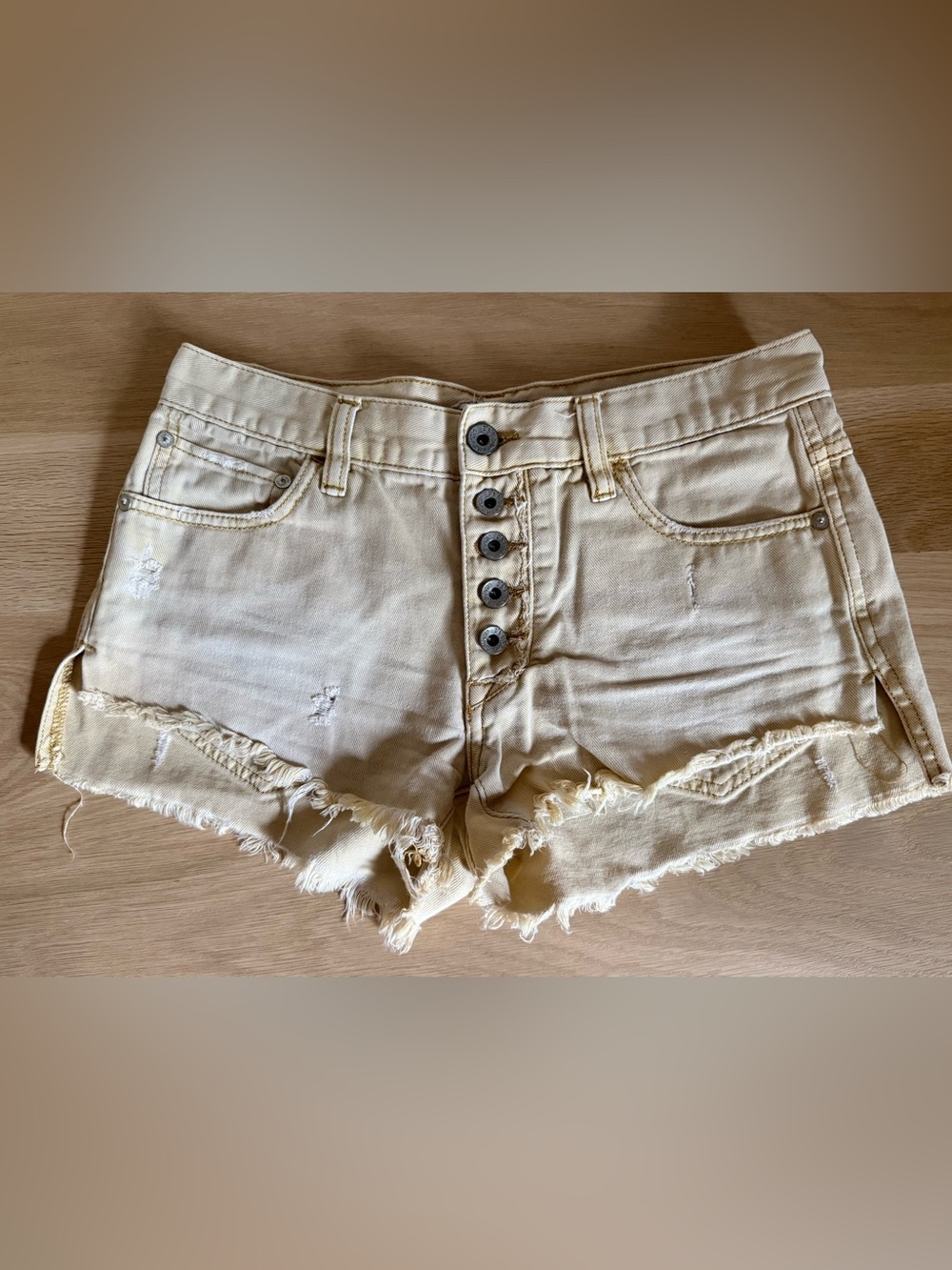 Free People Butter Yellow Distressed Button-Front Denim Shorts